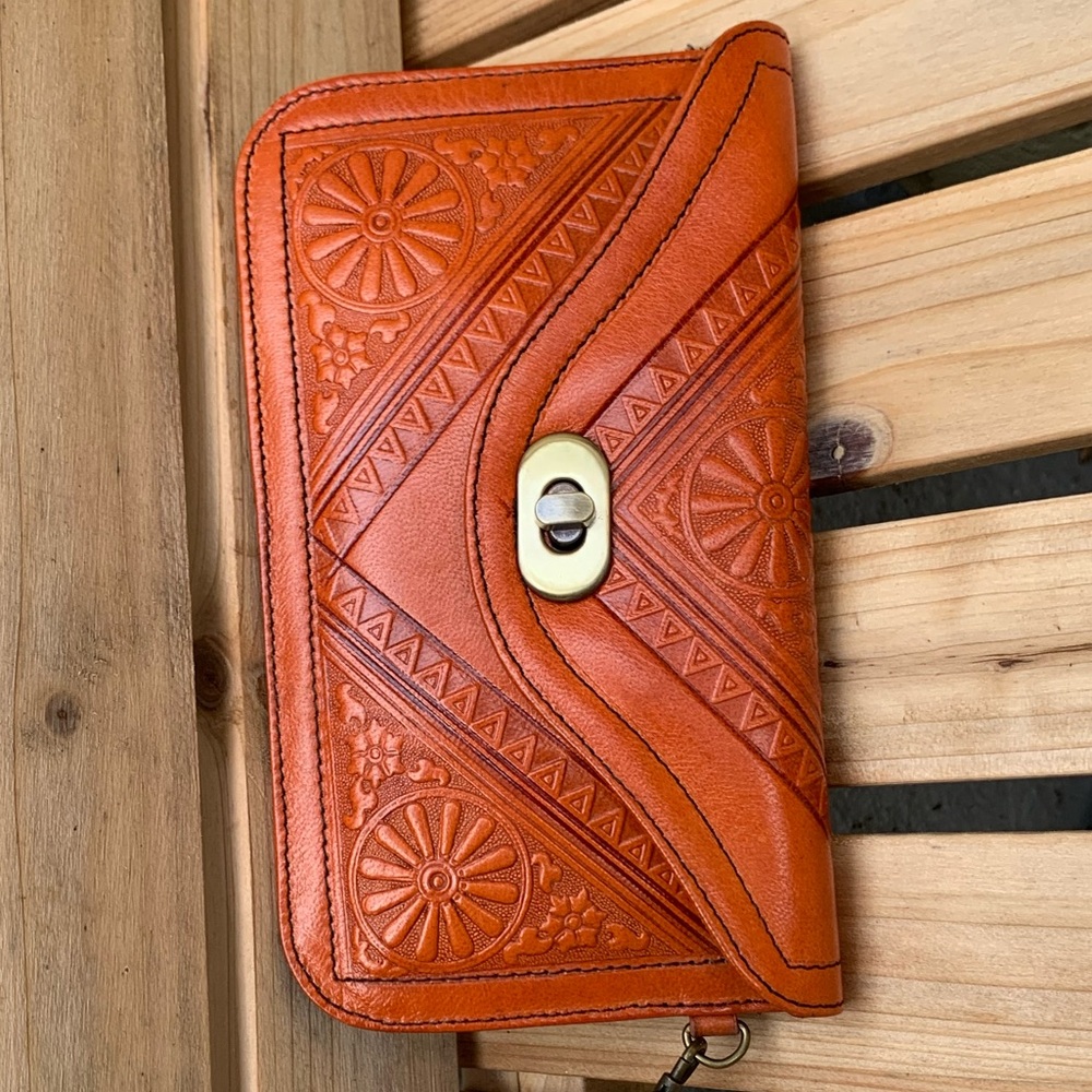 Orange leather wristlet